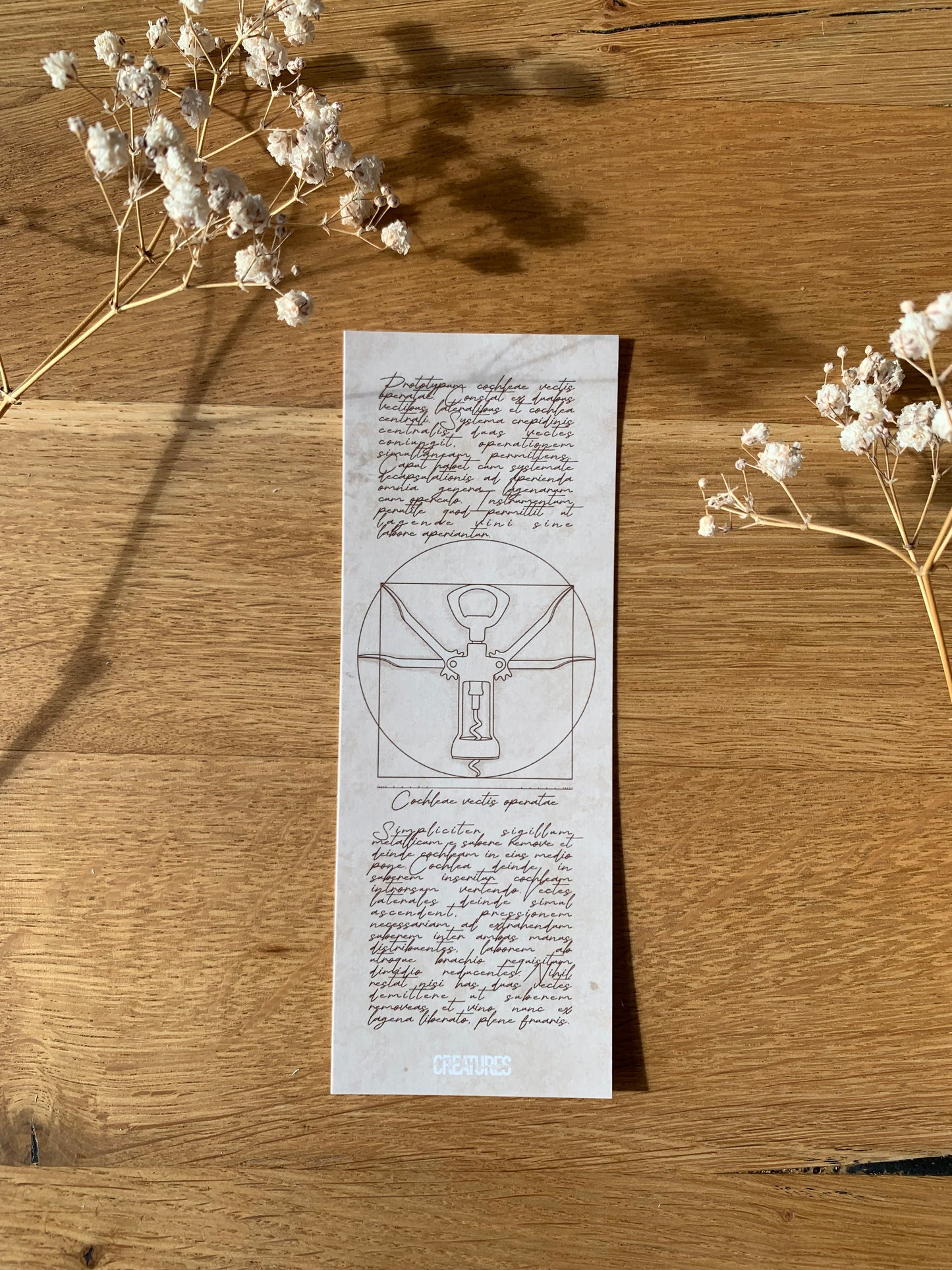 Marque pages du dessin détourné de l’Homme de Vitruve de De Vinci façon tire bouchon