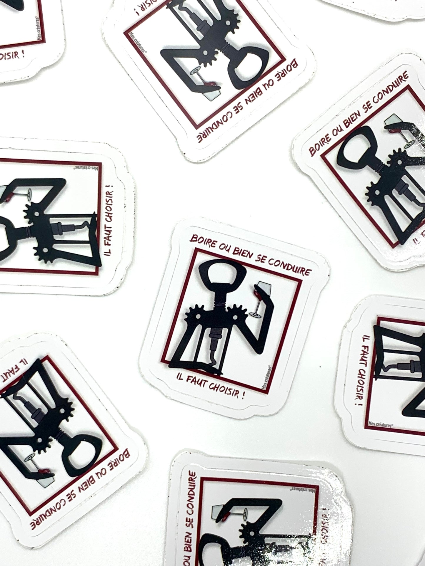 Illustration tire-bouchon buvant un verre de vin, avec un message de prévention : Boire ou bien se conduire il faut choisir !