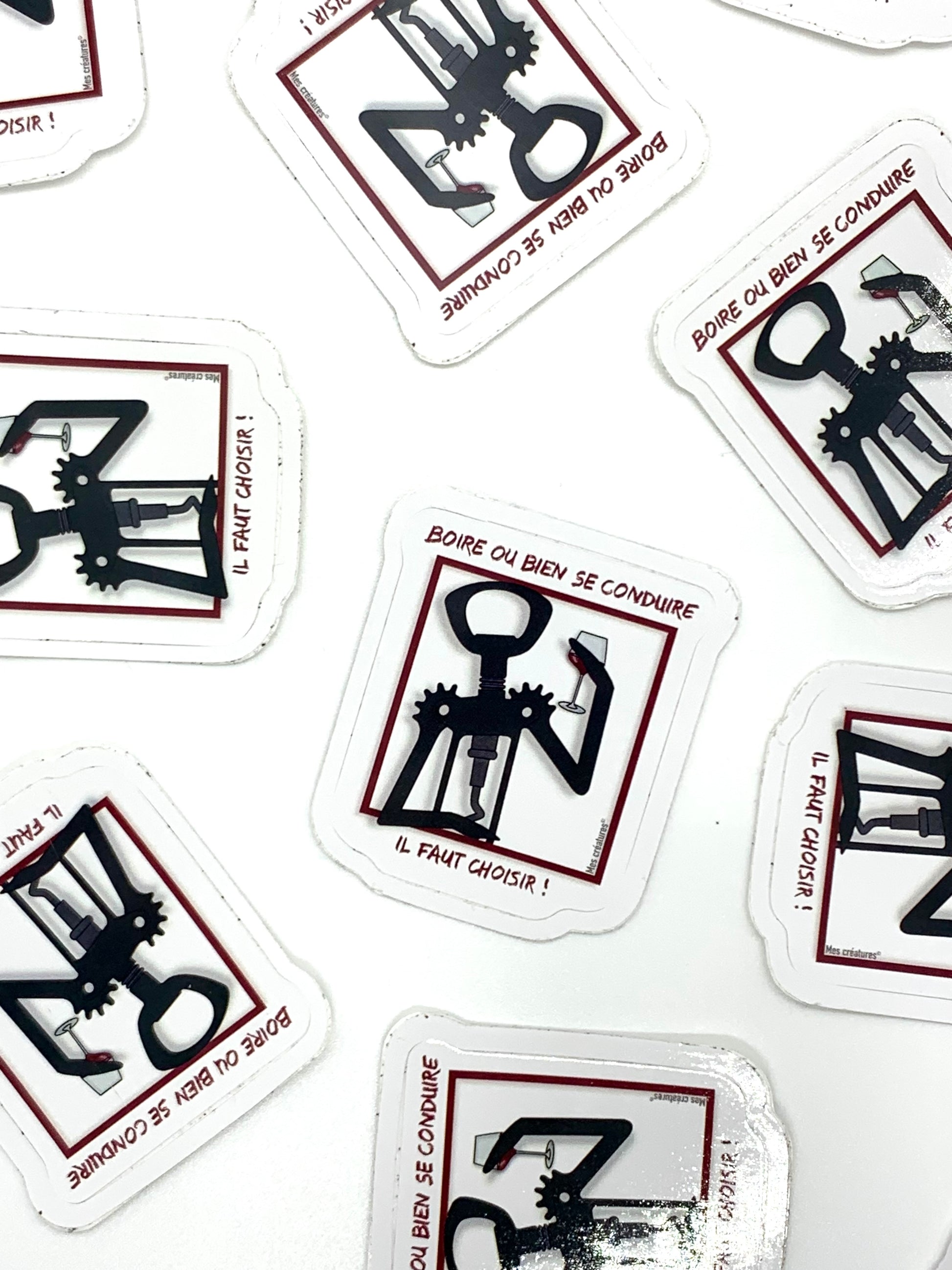 Illustration tire-bouchon buvant un verre de vin, avec un message de prévention : Boire ou bien se conduire il faut choisir !