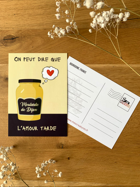 Carte postale humoristique avec un jeu de mot entre moutarde et l’amour tarde